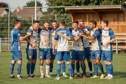 Équipe de football amateur des Yvelines célébrant une victoire lors d'un championnat de district FFF